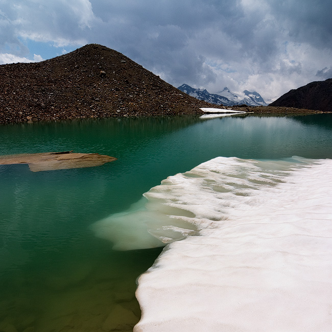  Fotografie Horské jezírko, Rakouské Alpy - Jezírko kousek od chaty Brandenburger Haus v rakouských Alpách, Oblast Ötztal.